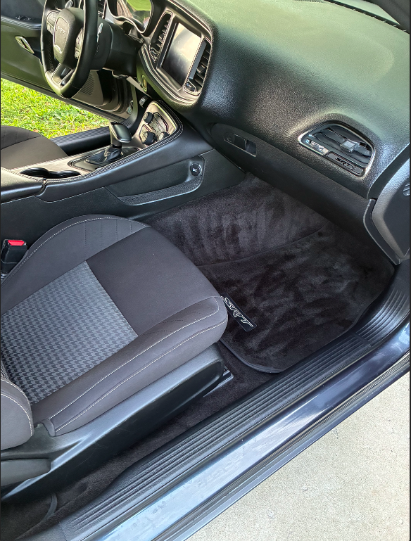 Dodge Challenger interior detail with clean carpets and seats